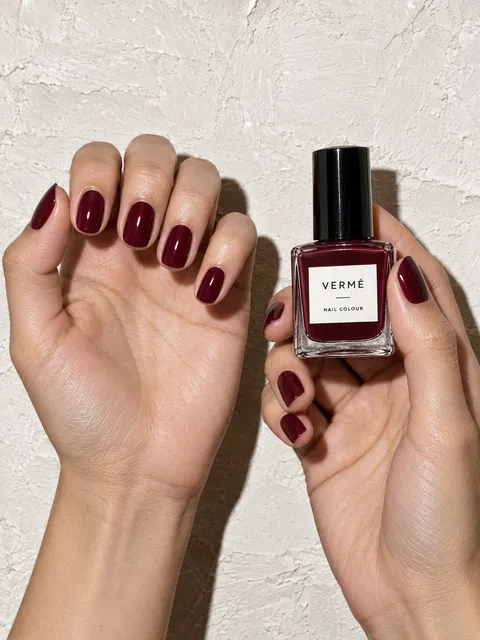 Nail polish — nails curled to camera, AI photo made with Pixo Studio