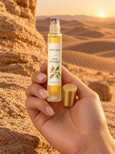 Perfume oil rollerball — resting in the palm, AI photo made with Pixo Studio