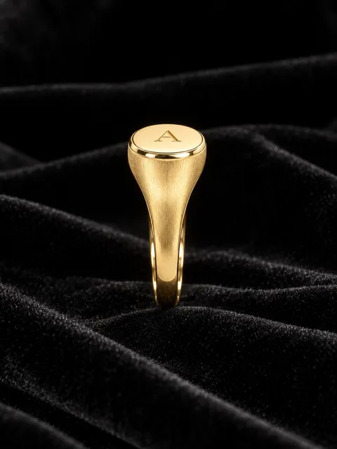 Gold signet ring — side, AI photo made with Pixo Studio